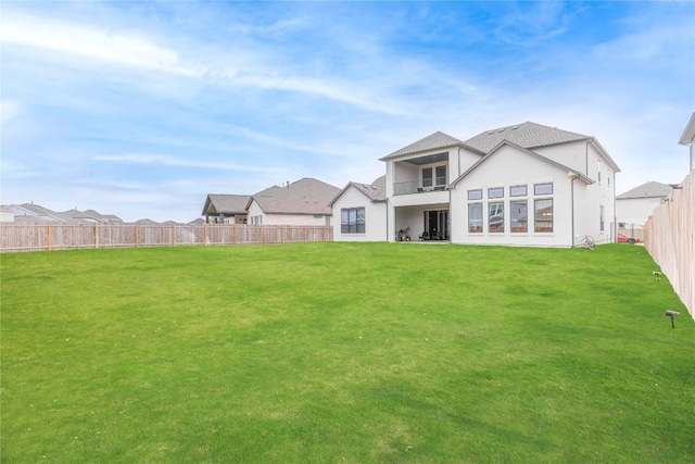 216 Reata Ridge Loop, Liberty Hill, TX 78642 - back of house featuring a balcony and stucco siding