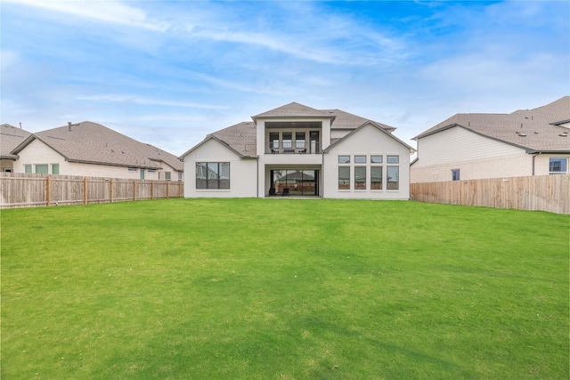 216 Reata Ridge Loop, Liberty Hill, TX 78642 - rear view of property with stucco siding and a balcony