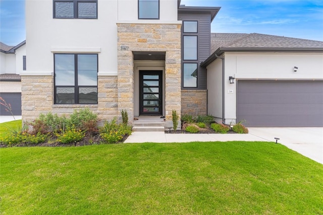 216 Reata Ridge Loop, Liberty Hill, TX 78642 - contemporary house featuring stone siding, a front yard, stucco siding, and concrete driveway