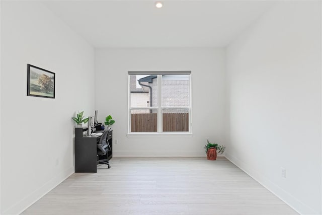 216 Reata Ridge Loop, Liberty Hill, TX 78642 - unfurnished office featuring light wood-type flooring, baseboards, and recessed lighting