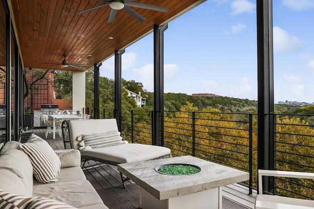 1337 Spyglass Dr, Austin, TX 78746 - view of patio featuring a ceiling fan, exterior kitchen, and a balcony