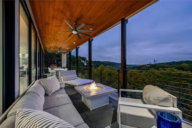 1337 Spyglass Dr, Austin, TX 78746 - view of patio with an outdoor living space with a fire pit, ceiling fan, and a balcony