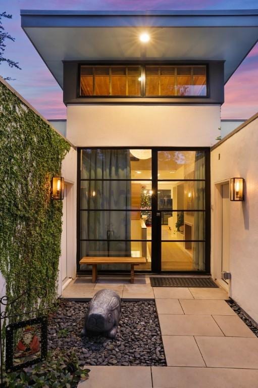 1337 Spyglass Dr, Austin, TX 78746 - view of exterior entry at dusk