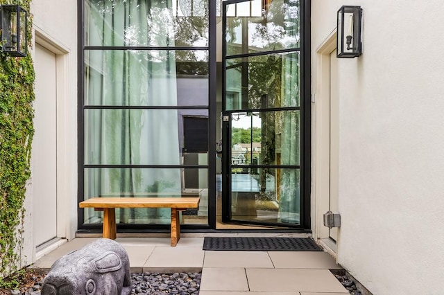 1337 Spyglass Dr, Austin, TX 78746 - doorway to property with stucco siding