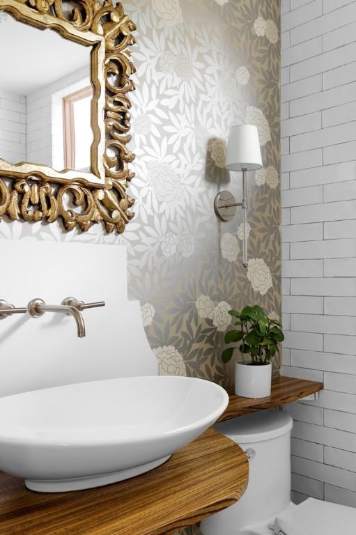 1337 Spyglass Dr, Austin, TX 78746 - bathroom with wallpapered walls, toilet, and a sink