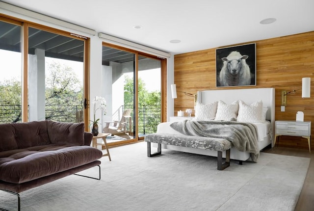 1337 Spyglass Dr, Austin, TX 78746 - bedroom with wood walls, access to outside, and floor to ceiling windows