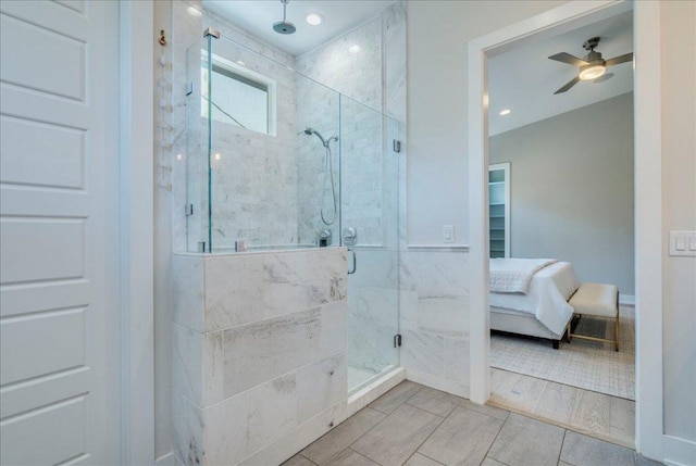 3004 Hunt Trl, Austin, TX 78757 - bathroom with ensuite bath, a marble finish shower, and a ceiling fan