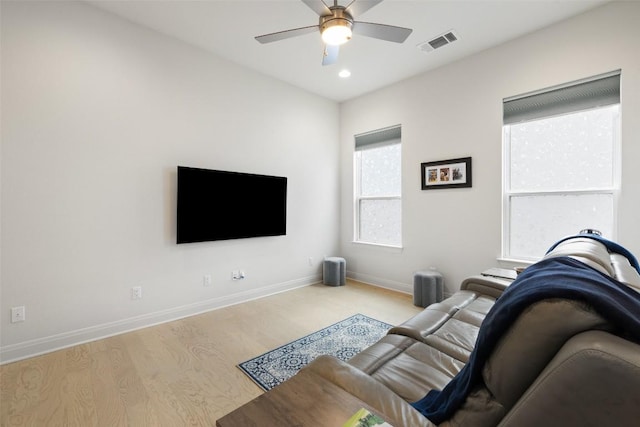 19401 Summit Glory Trl Unit 80, Spicewood, TX 78669 - living room featuring wood finished floors, ceiling fan, baseboards, and recessed lighting