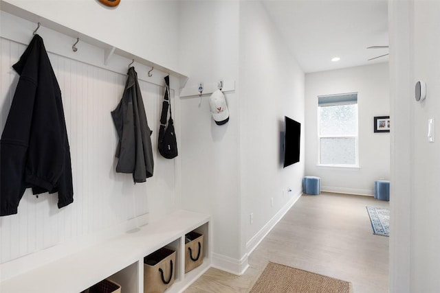 19401 Summit Glory Trl Unit 80, Spicewood, TX 78669 - mudroom with baseboards and light wood-style floors