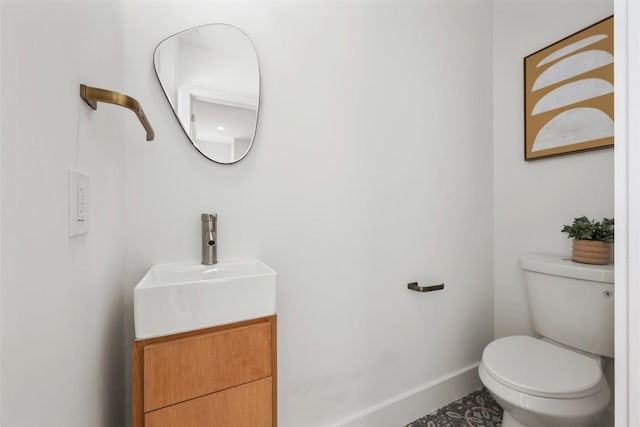 106 W Croslin St Unit B, Austin, TX 78752 - half bath featuring baseboards, vanity, and toilet