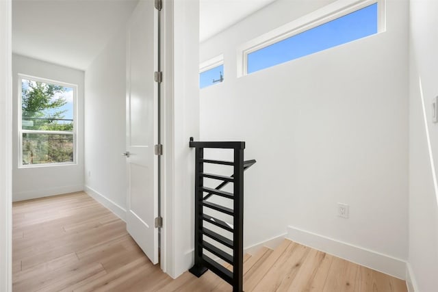 106 W Croslin St Unit B, Austin, TX 78752 - stairway featuring wood finished floors and baseboards