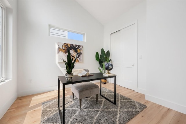 106 W Croslin St Unit B, Austin, TX 78752 - office area with light wood-style flooring, high vaulted ceiling, and baseboards