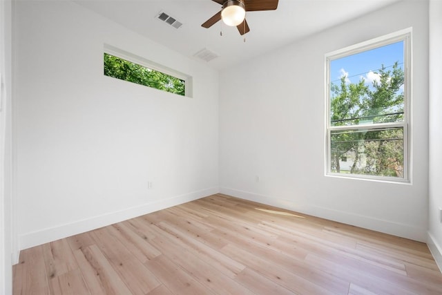 106 W Croslin St Unit B, Austin, TX 78752 - spare room with plenty of natural light, a ceiling fan, baseboards, and light wood-type flooring