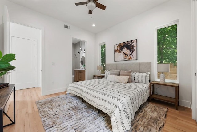 106 W Croslin St Unit B, Austin, TX 78752 - bedroom featuring light wood-type flooring, baseboards, recessed lighting, ensuite bath, and ceiling fan