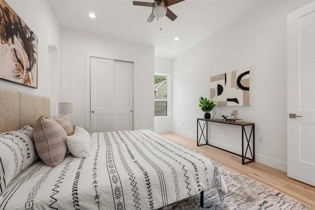 106 W Croslin St Unit B, Austin, TX 78752 - bedroom with wood finished floors, baseboards, a closet, recessed lighting, and ceiling fan