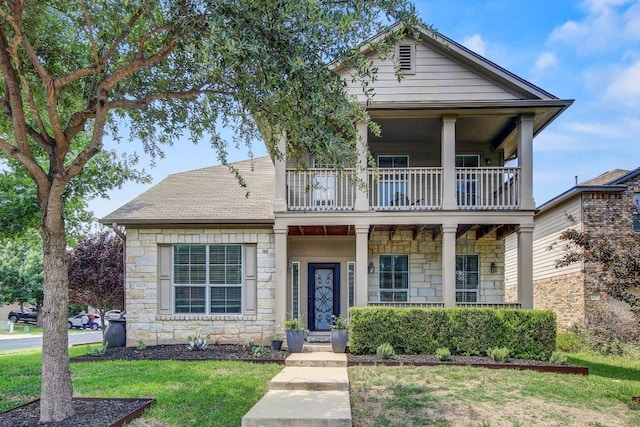 14028 Turkey Hollow Trl, Austin, TX 78717 - view of front of home featuring a balcony, stone siding, a front lawn, and a porch