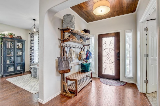 14028 Turkey Hollow Trl, Austin, TX 78717 - foyer entrance with ornamental molding, wood finished floors, baseboards, and wood ceiling