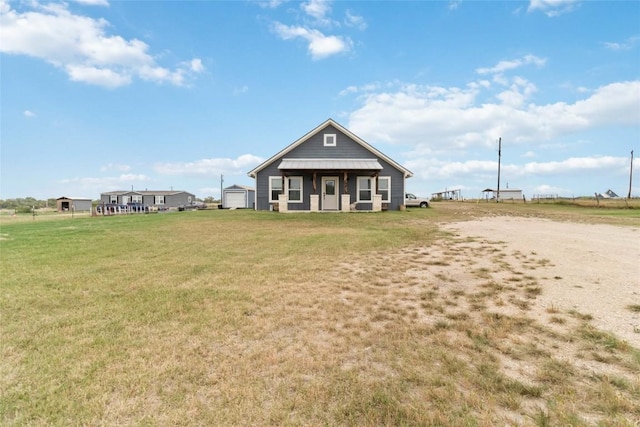 1581 Washburn Rd, Luling, TX 78648 - view of front of property featuring a front yard and dirt driveway