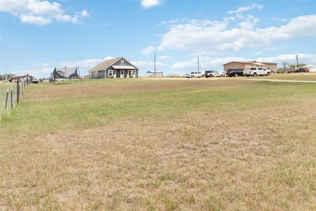 1581 Washburn Rd, Luling, TX 78648 - view of yard featuring a trampoline