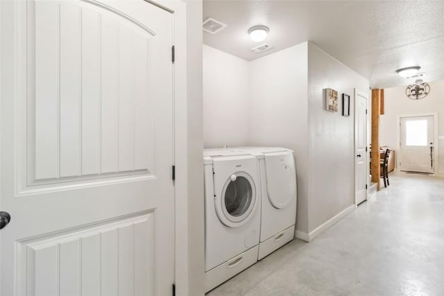 1581 Washburn Rd, Luling, TX 78648 - laundry area featuring washer and dryer and baseboards