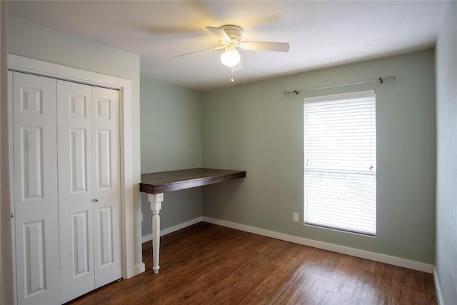 609 Pigeon Forge Rd, Pflugerville, TX 78660 - unfurnished bedroom featuring a closet, baseboards, dark wood-style flooring, and a ceiling fan