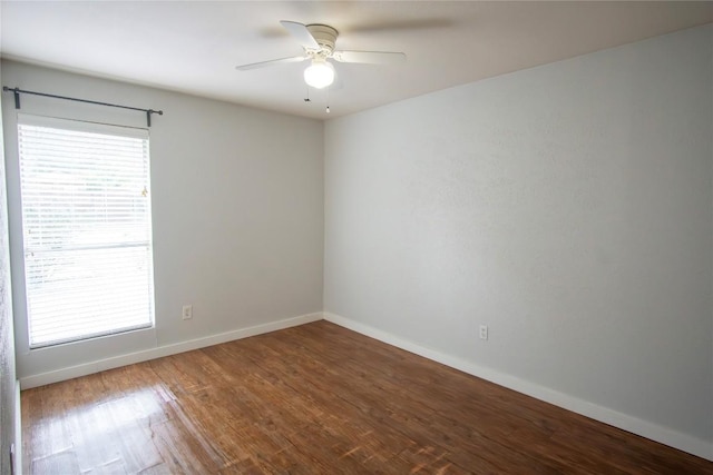 609 Pigeon Forge Rd, Pflugerville, TX 78660 - unfurnished room featuring baseboards, wood finished floors, and a ceiling fan