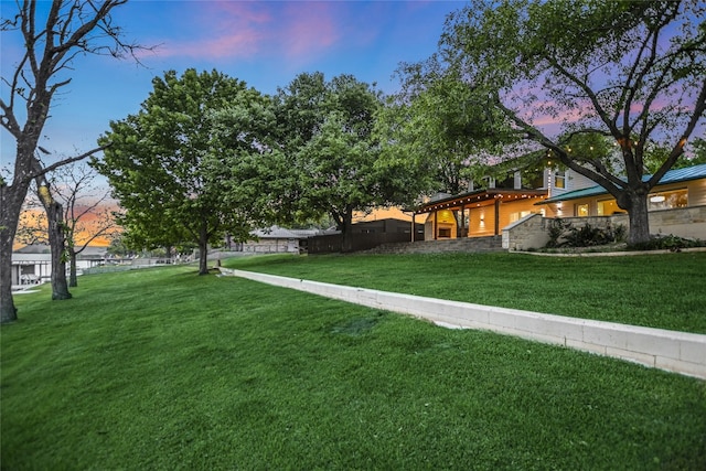 1704 Bluebonnet Ln, Kingsland, TX 78639 - yard at dusk with a lawn