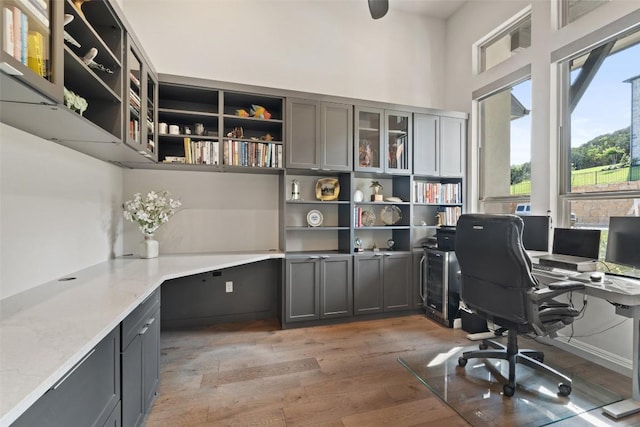 158 Baldovino Skwy, Lakeway, TX 78738 - office area featuring light wood-style flooring and built in desk