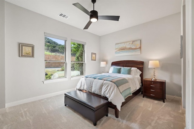158 Baldovino Skwy, Lakeway, TX 78738 - bedroom with baseboards, light carpet, and ceiling fan