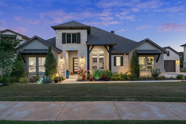 158 Baldovino Skwy, Lakeway, TX 78738 - view of front of property with stone siding, a standing seam roof, a front lawn, and metal roof