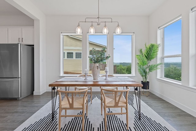 425 Dayridge Dr, Dripping Springs, TX 78620 - dining room with dark wood-type flooring and baseboards