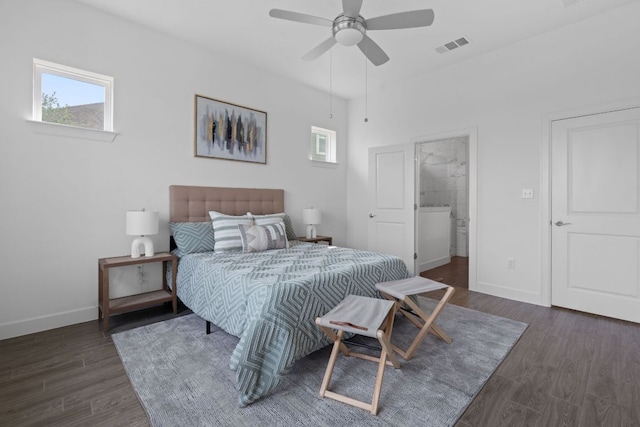 425 Dayridge Dr, Dripping Springs, TX 78620 - bedroom featuring multiple windows, baseboards, and wood finished floors
