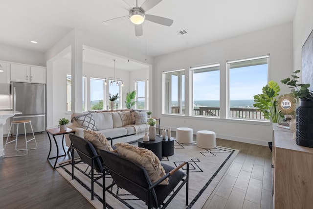 425 Dayridge Dr, Dripping Springs, TX 78620 - living area with healthy amount of natural light, dark wood-style flooring, ceiling fan, baseboards, and recessed lighting