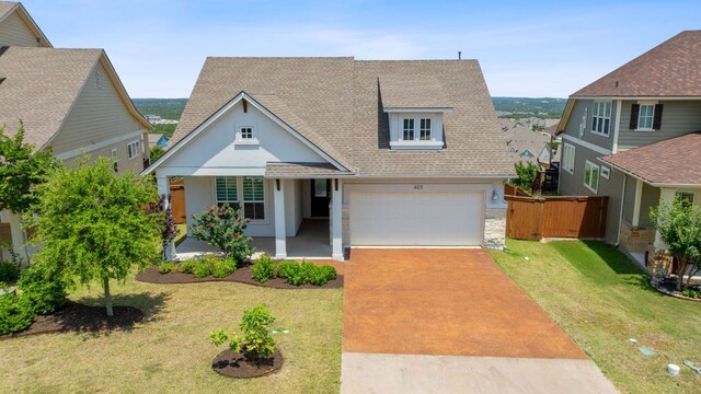 425 Dayridge Dr, Dripping Springs, TX 78620 - view of front of home with a porch, concrete driveway, a shingled roof, a garage, and stucco siding