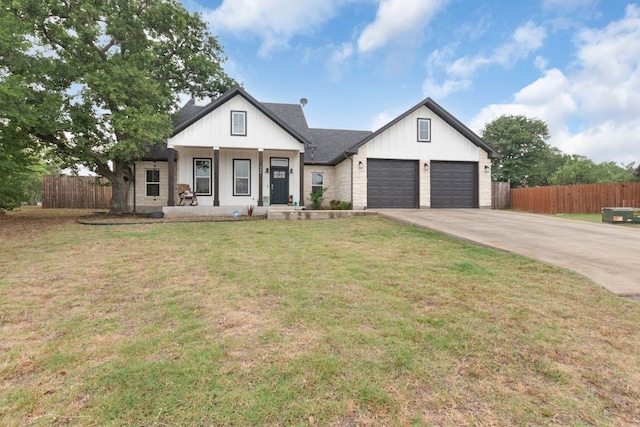 110 Lakecliff Cv, Kingsland, TX 78639 - modern inspired farmhouse with a garage, driveway, and a porch