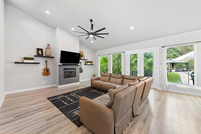 20702 Post Oak Dr, Lago Vista, TX 78645 - living room with a ceiling fan, plenty of natural light, light wood finished floors, recessed lighting, and high vaulted ceiling