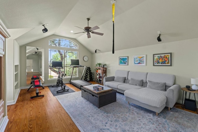 205 Champion Dr, Lakeway, TX 78734 - living area with ceiling fan, vaulted ceiling, and wood finished floors