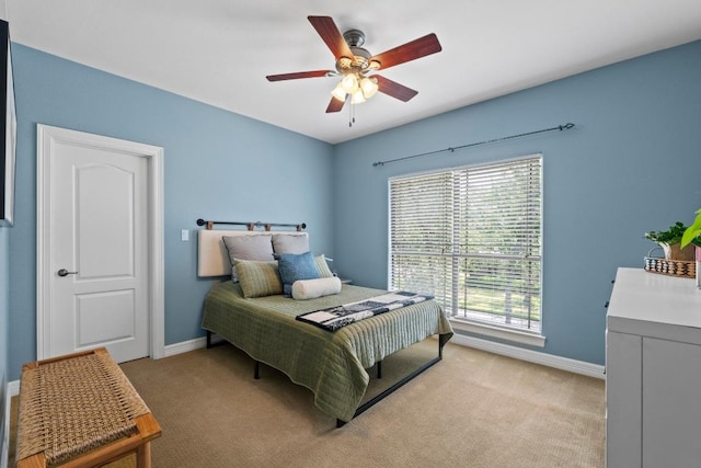 205 Champion Dr, Lakeway, TX 78734 - bedroom with light colored carpet and ceiling fan