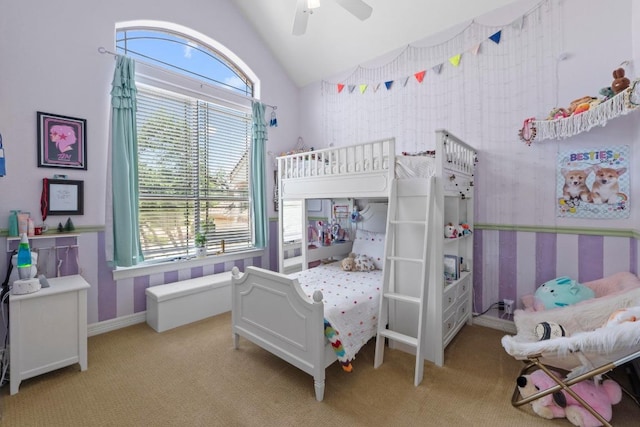 205 Champion Dr, Lakeway, TX 78734 - bedroom featuring vaulted ceiling, light carpet, and a ceiling fan