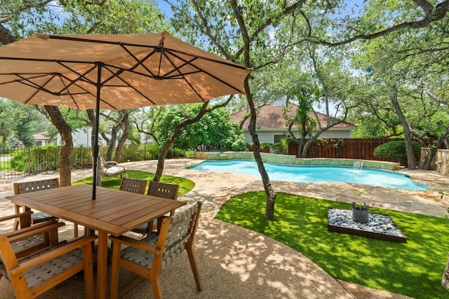 205 Champion Dr, Lakeway, TX 78734 - view of swimming pool featuring a fenced backyard, a patio area, and outdoor dining area