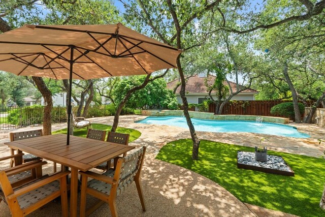 205 Champion Dr, Lakeway, TX 78734 - view of pool with a fenced backyard, a patio area, and outdoor dining area