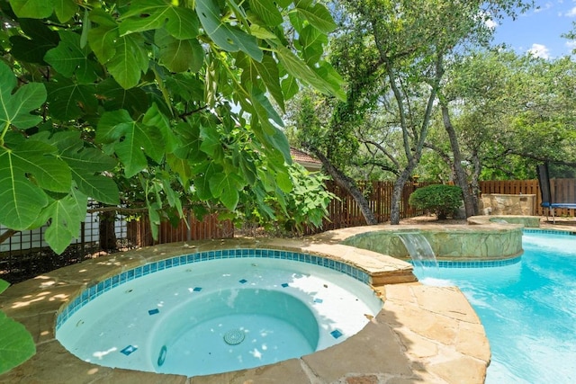 205 Champion Dr, Lakeway, TX 78734 - view of pool featuring a fenced backyard and a pool with connected hot tub