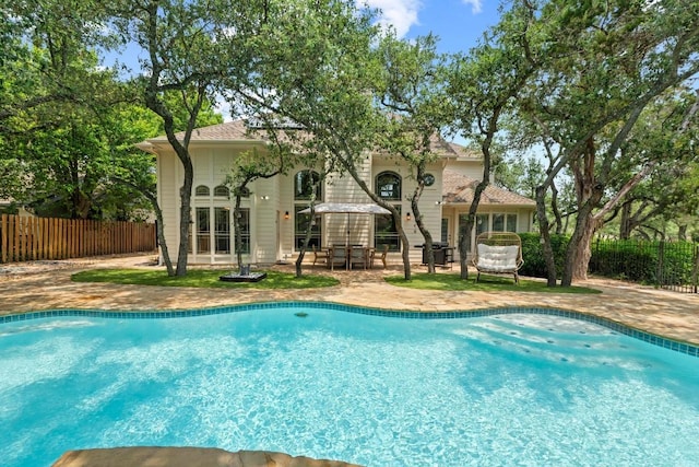 205 Champion Dr, Lakeway, TX 78734 - view of swimming pool featuring a patio
