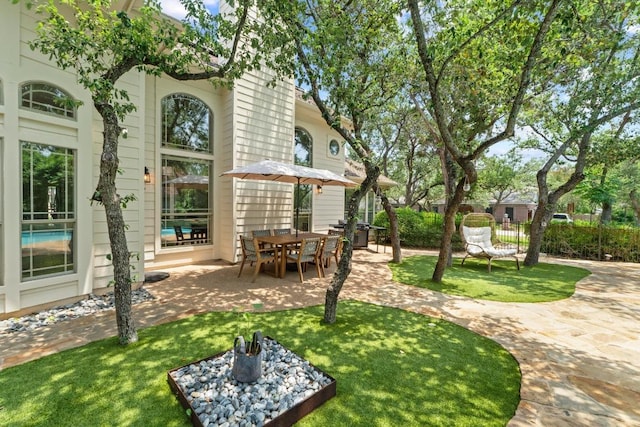 205 Champion Dr, Lakeway, TX 78734 - view of green lawn featuring a patio