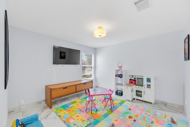 18400 Sun Haven Cv, Elgin, TX 78621 - playroom featuring light marble finish flooring