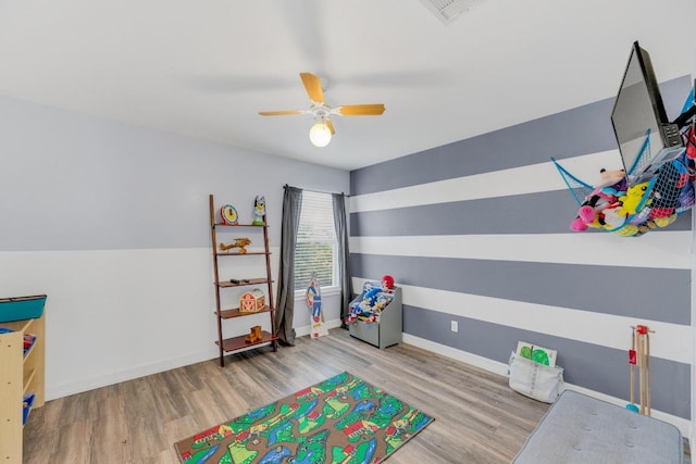 18400 Sun Haven Cv, Elgin, TX 78621 - rec room with wood finished floors, ceiling fan, and baseboards