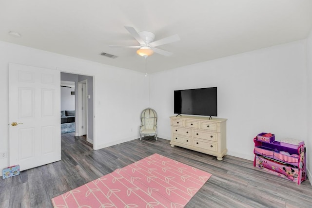 18400 Sun Haven Cv, Elgin, TX 78621 - bedroom with wood finished floors and a ceiling fan
