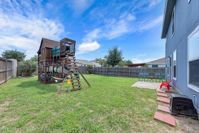 18400 Sun Haven Cv, Elgin, TX 78621 - view of yard with a playground and a patio area