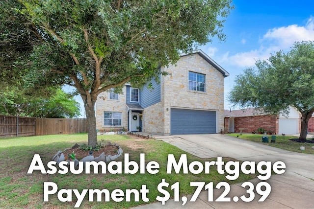 18400 Sun Haven Cv, Elgin, TX 78621 - traditional-style house with stone siding, a garage, and concrete driveway