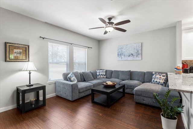 103 Lei Ct, Bastrop, TX 78602 - living area with dark wood finished floors, a ceiling fan, and baseboards